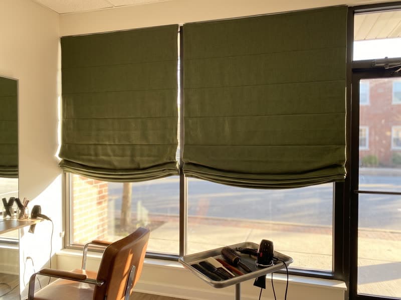 Olive roman shades in a Woodstock hair salon