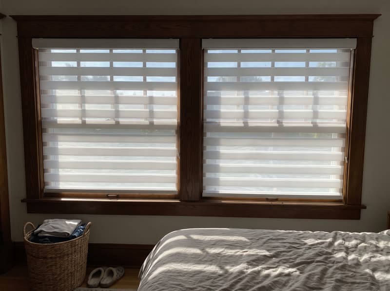 White zebra shade closed for privacy in a Roswell bedroom