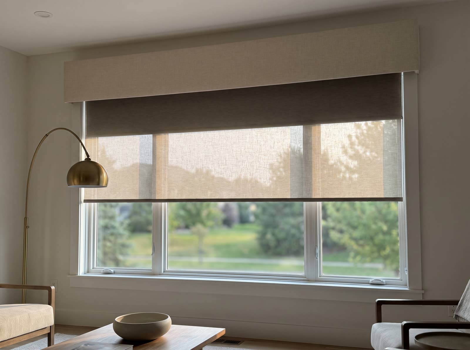 Dual shade with fabric-wrapped cassette in an Alpharetta living room